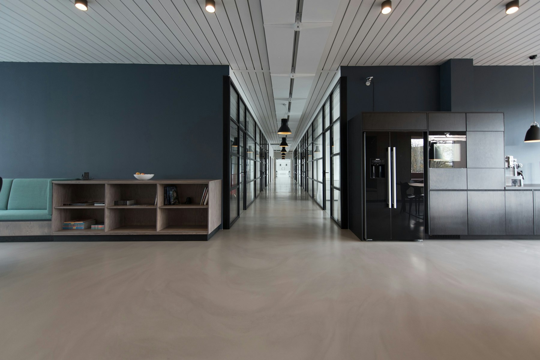 The Voss studio at work — long tables, samples, and models