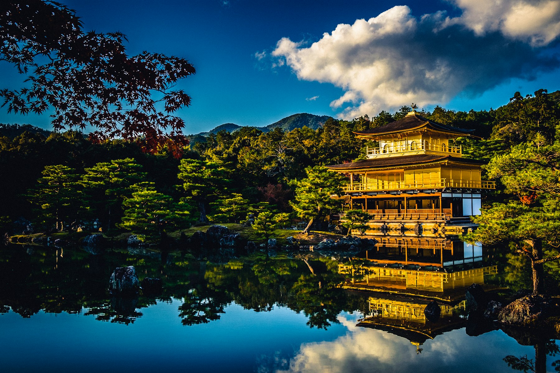 The golden pavilion of Kinkaku-ji reflected in its pond