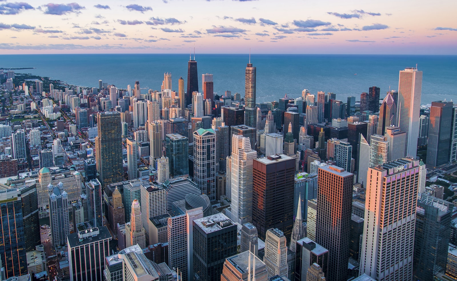 An aerial city skyline at dusk