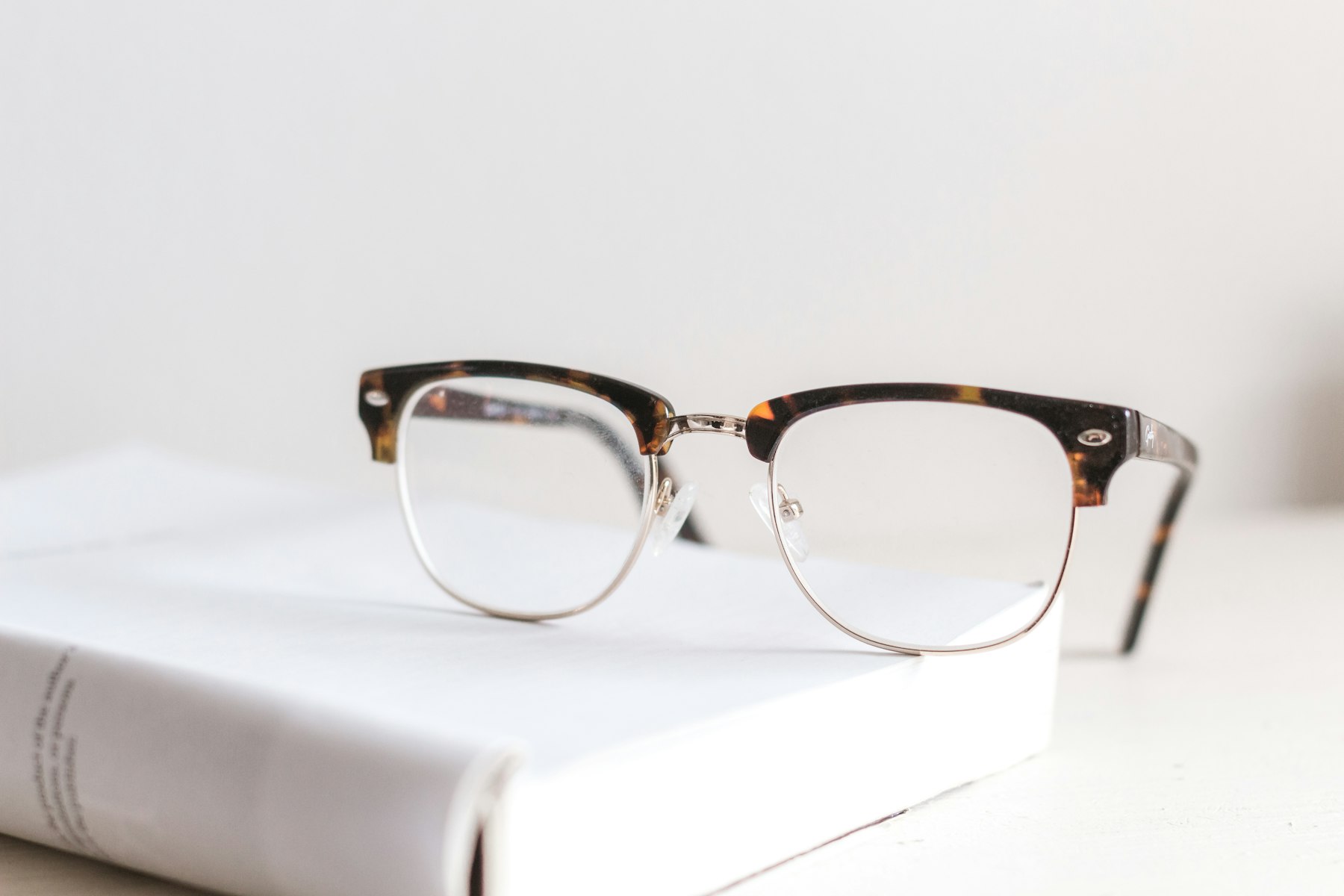 Glasses resting on a book